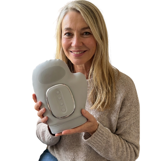 Person holding the Nuvoira Restore Pro